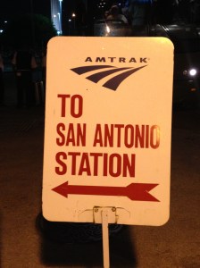 Sign to the station positioned on the platform...